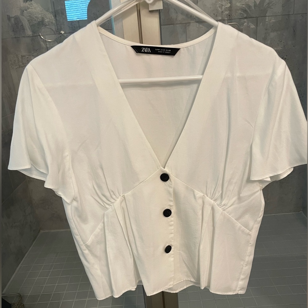 Zara white blouse with black buttons